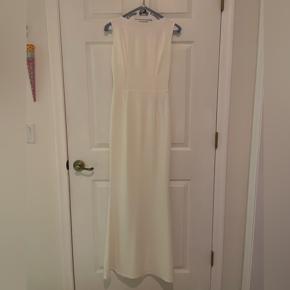 Elegant Ivory Sleeveless Draped Back Gown